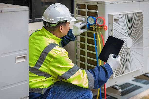 Professional Hvac technician working in Big Lake, WA